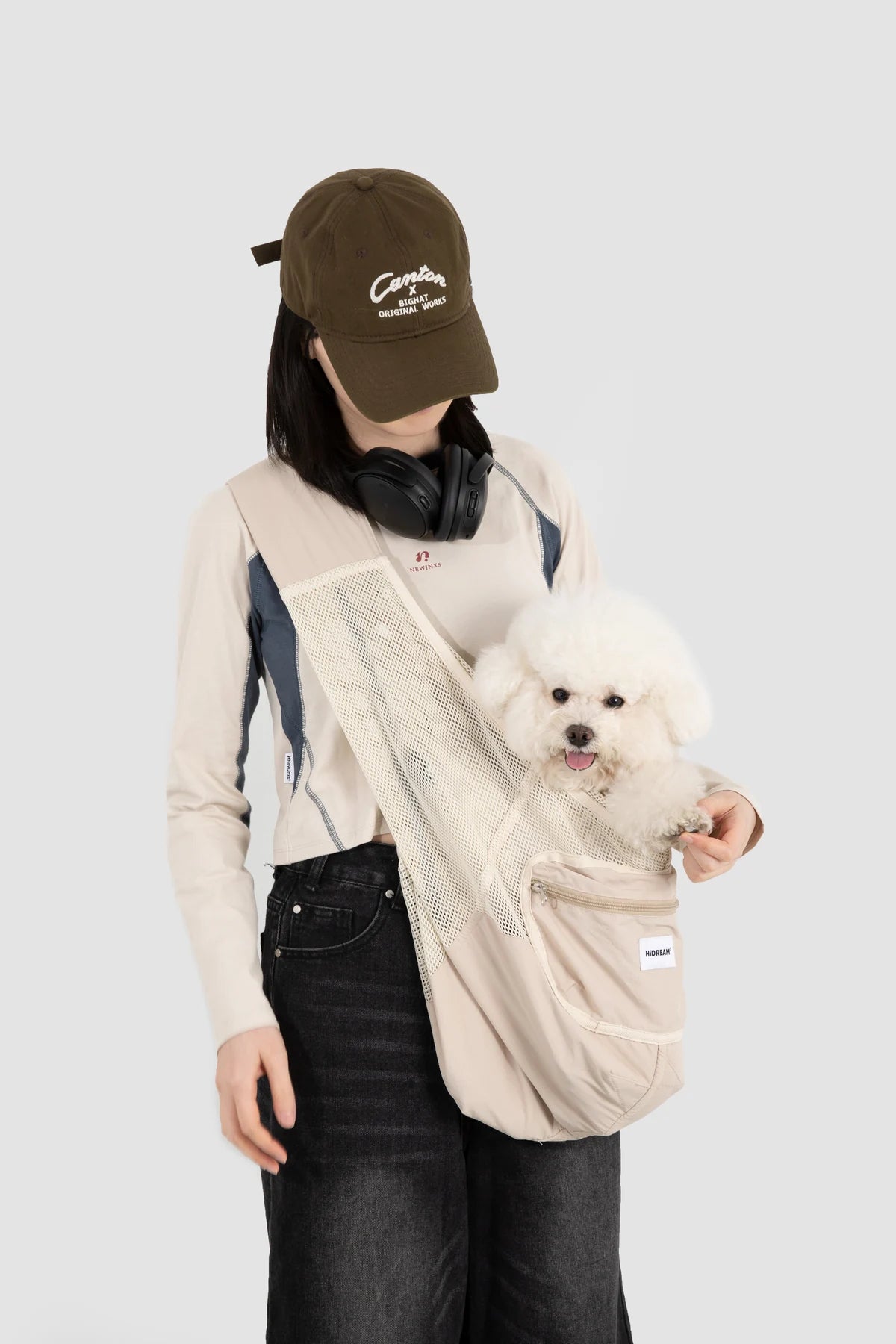 Full view of the Milk Tea Brown sling on its wearer