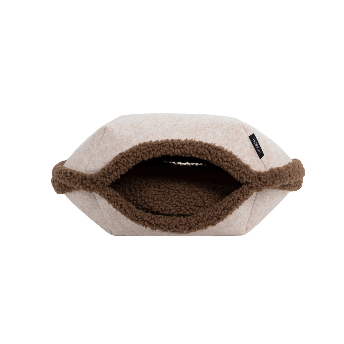 Brown Tart bed in its hooded form, shown whole