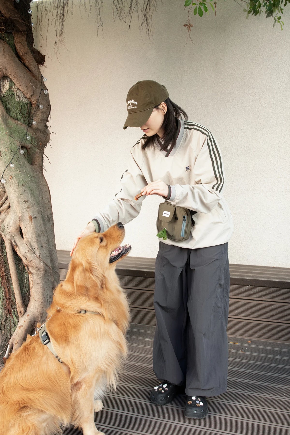 Wearing scene: deep moss green — Toast Training Treat Pouch