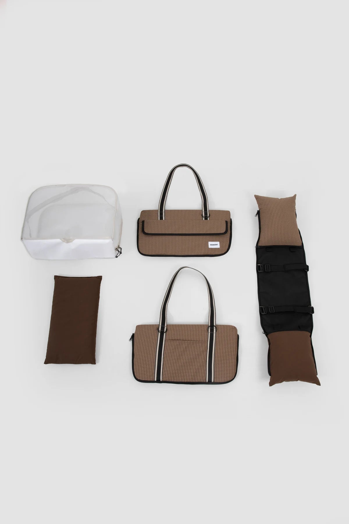 Carrier, mesh cover, insert and straps laid out