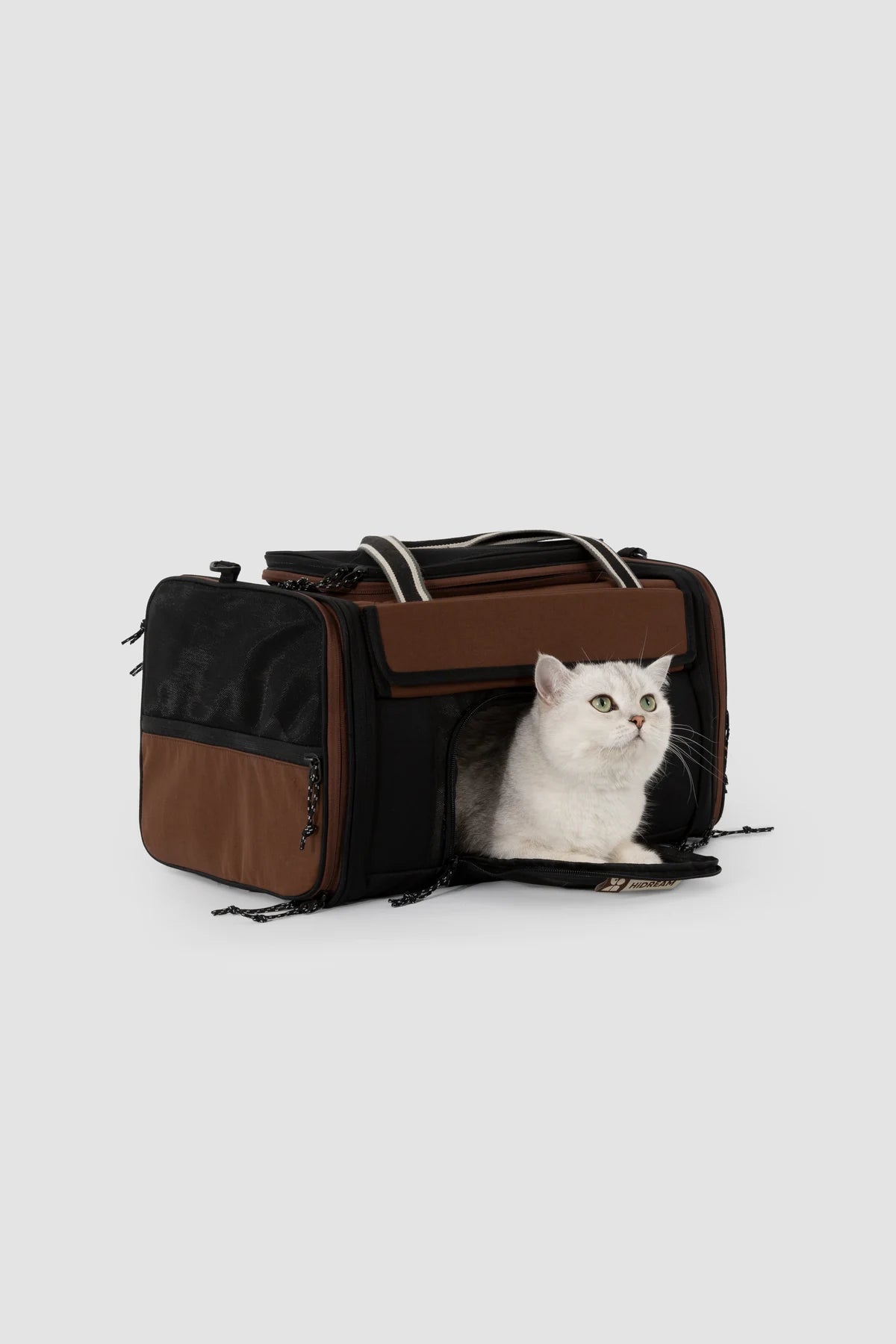 Compact carrier with the front mesh door open