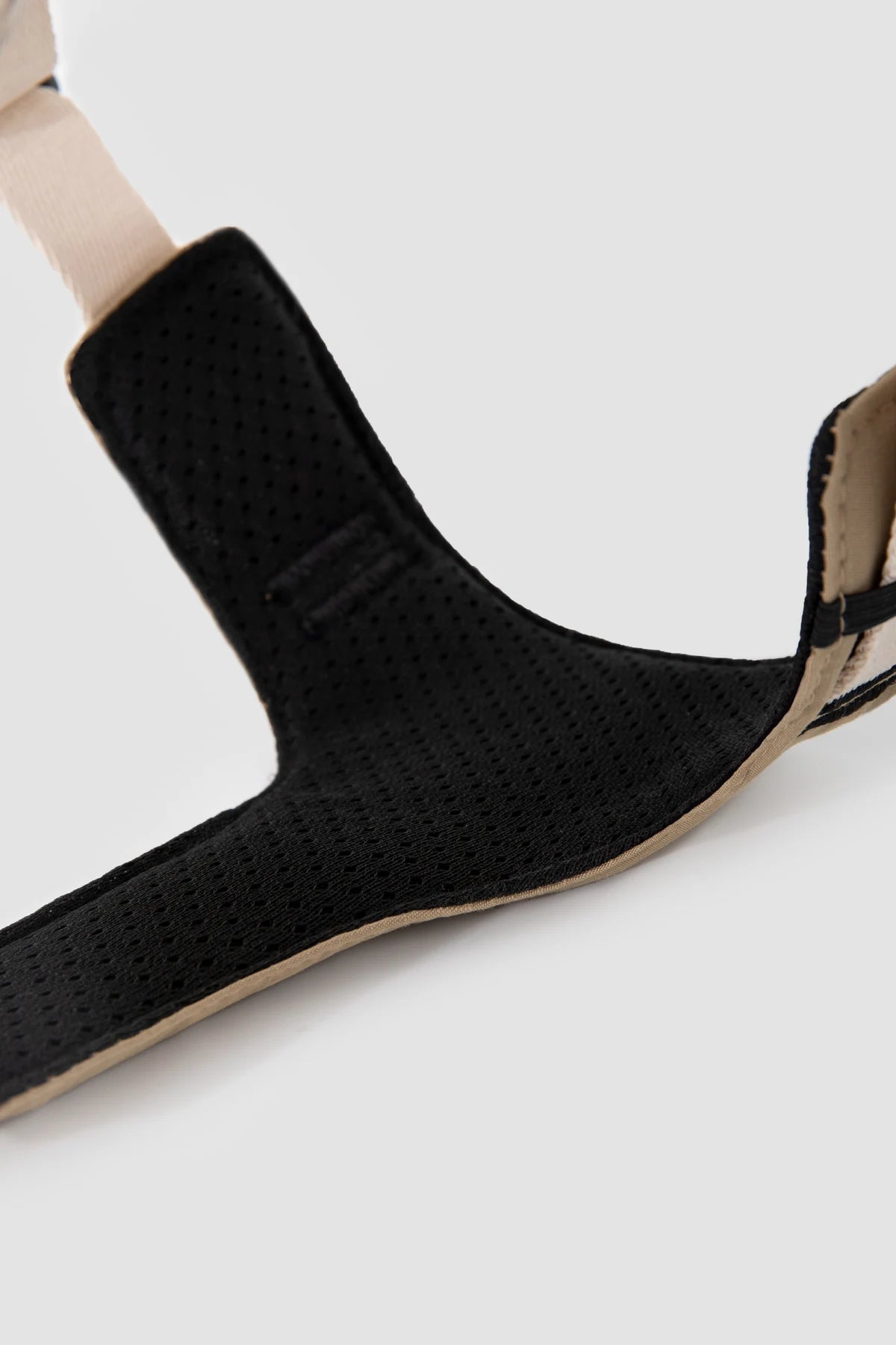 Close view of the black padded harness lining