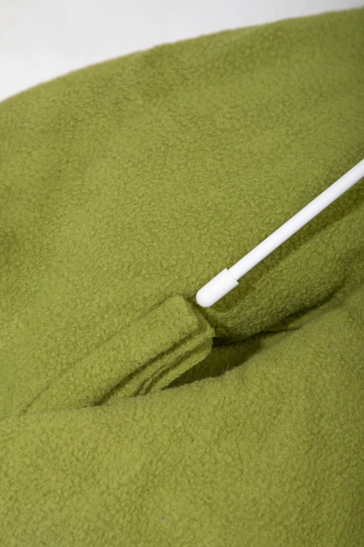 Flexible support insert at the Matcha Green fabric channel