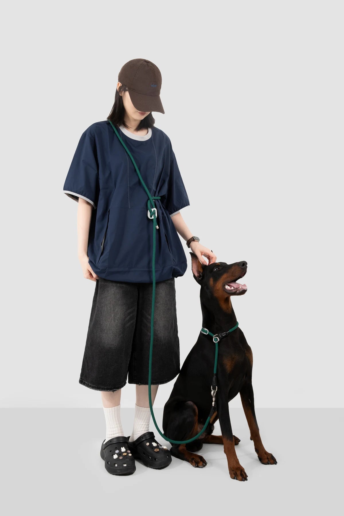 Turquoise Green rope collar and leash set with the leash worn crossbody