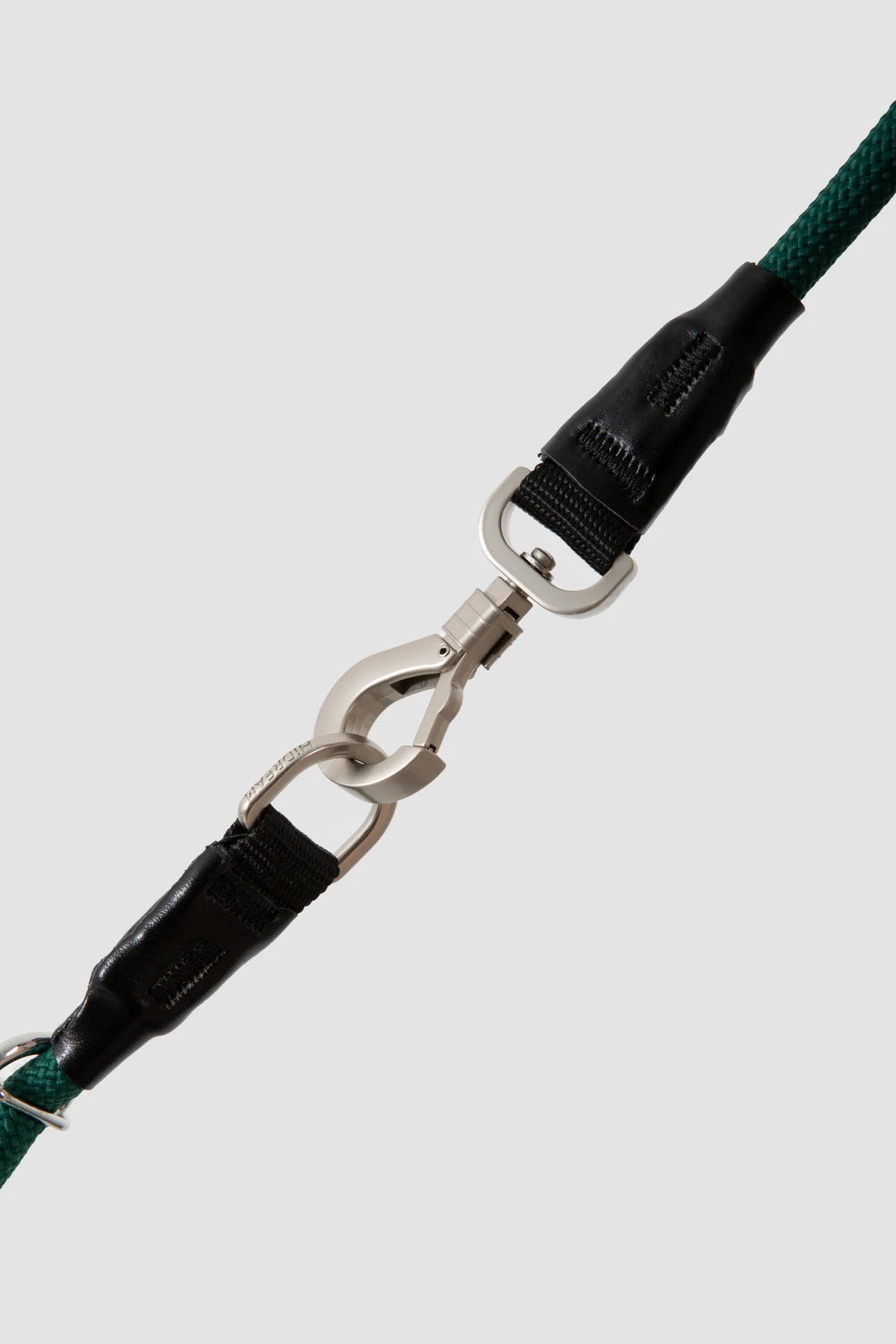 Metal clasp and stitched attachment on the rope leash