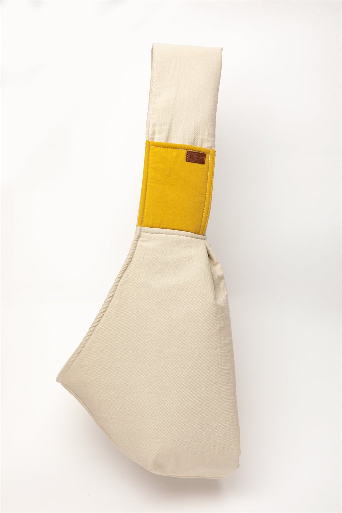 Cream and yellow cotton pet sling with its adjustable strap