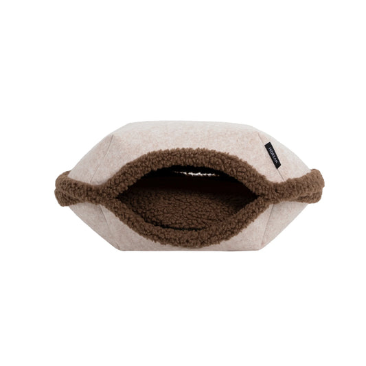 Brown Tart bed in its hooded form, shown whole