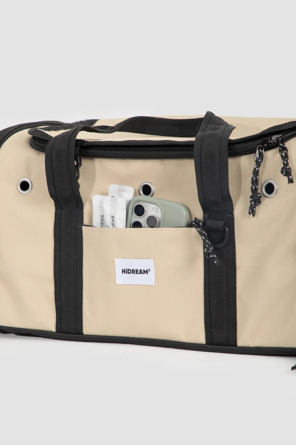 Front pocket on the Dune Brown carrier