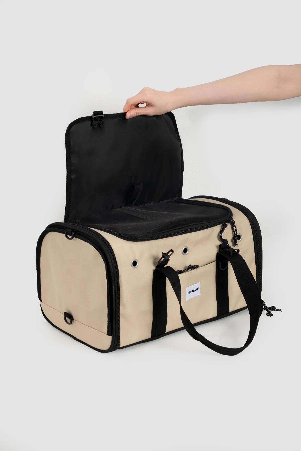 Dune Brown carrier with its top mesh opening raised