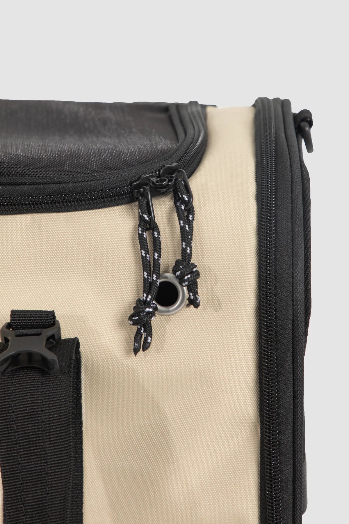 Close view of the paired carrier zippers