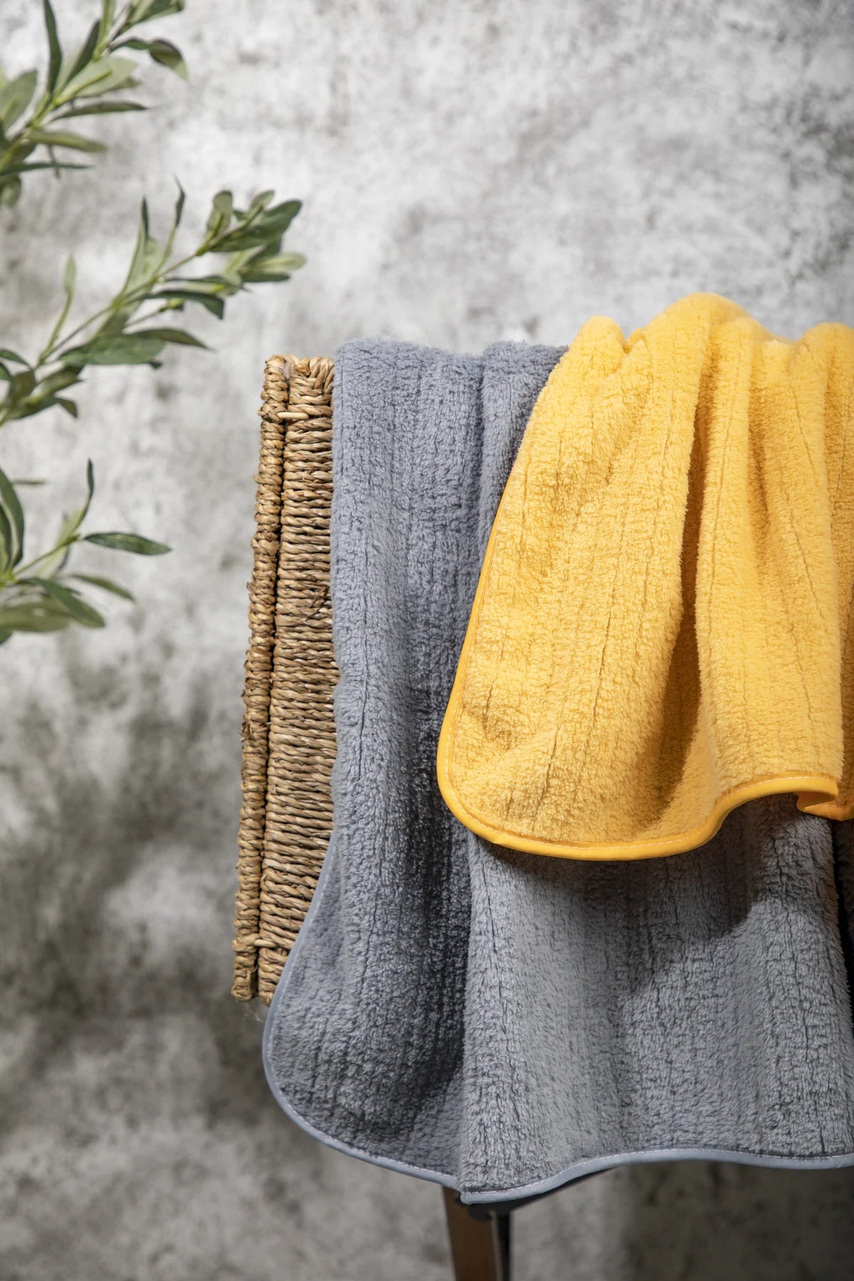 Cloud Gray and Sunflower Yellow towels hanging side by side; sold individually