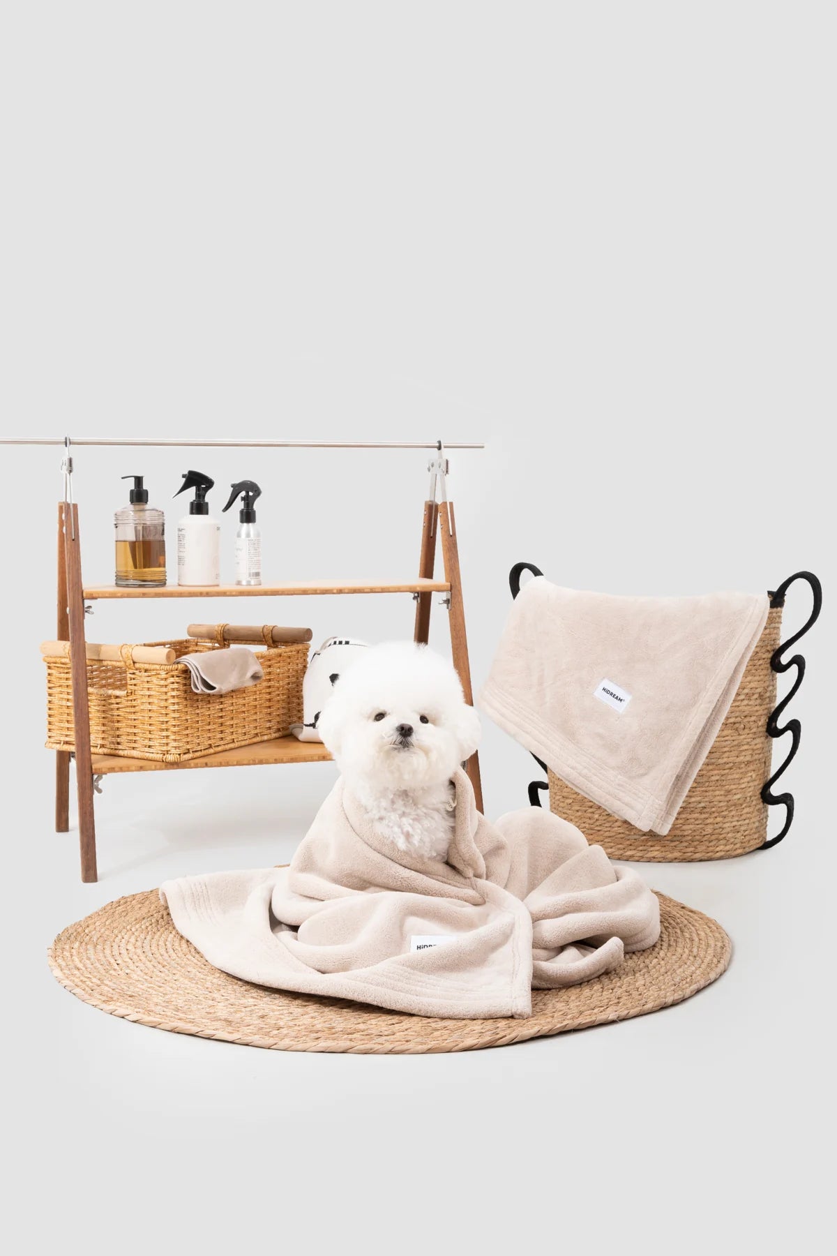 The actual Milk Brown towel, shown around a small dog. Arrange it loosely and keep the face clear.