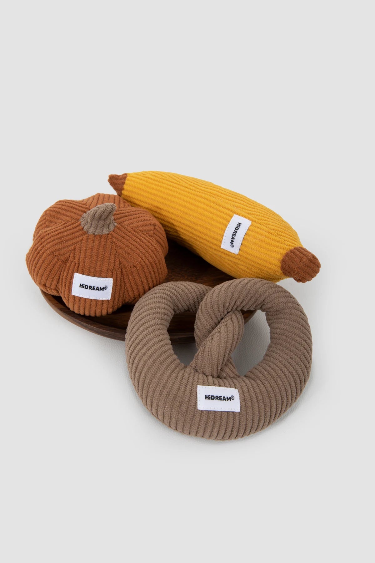 Pretzel, Pumpkin and Banana shapes together; one selected toy per order