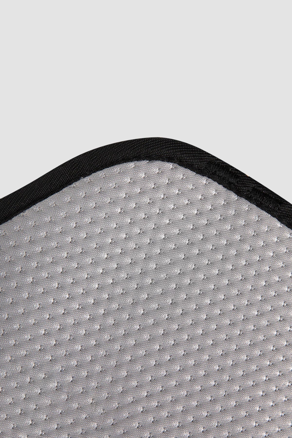Close view of the inner mesh and edged opening