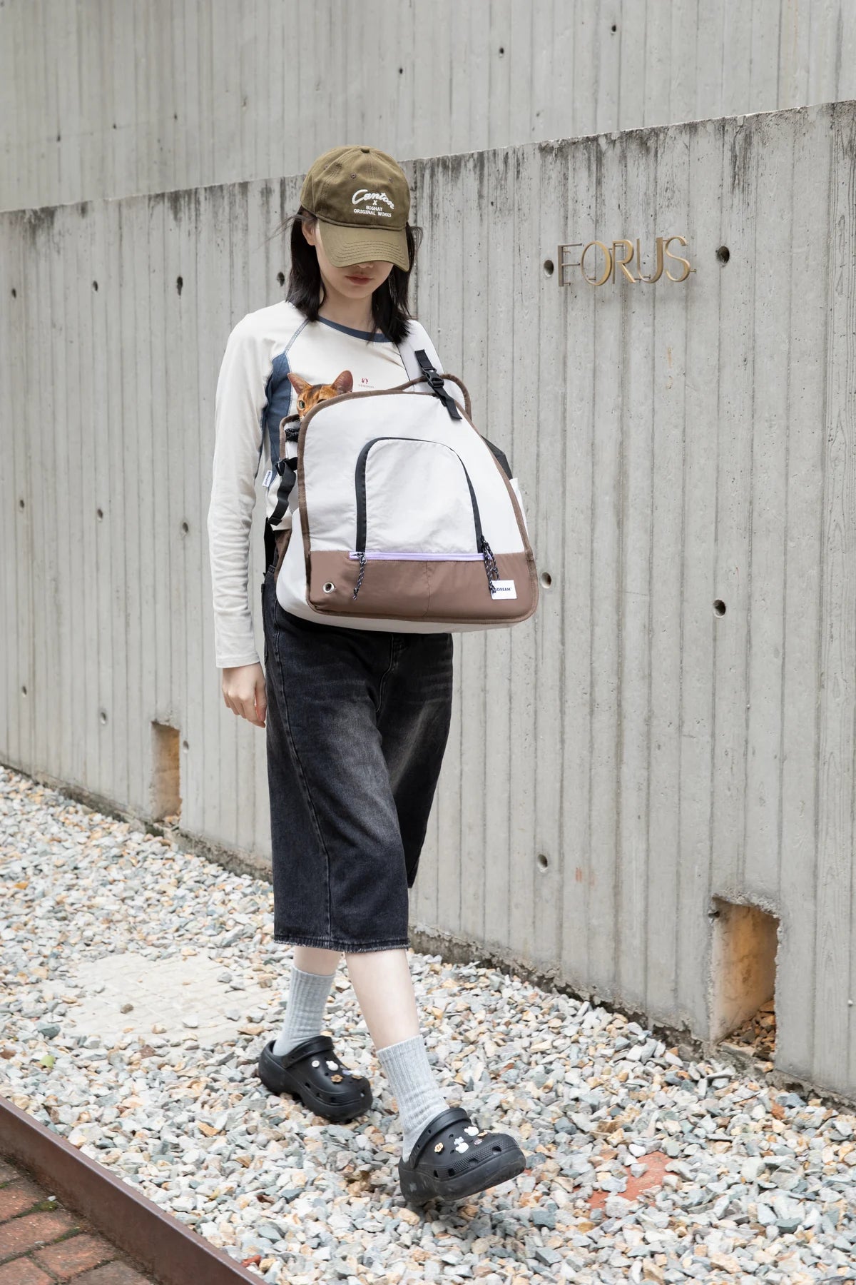 Owner wearing the carrier on a quiet outdoor path